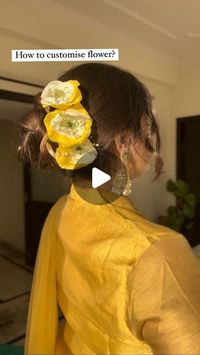 Tanya Singh on Instagram: "How to customise real flowers acc to your outfit ✨
.
.
.
#hairhack #hair #hair #longhair #itistanyasingh #reels #reelsinstagram"