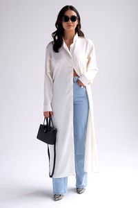 Oversized with pleated long sleeves and side slits Runs slightly large Model wears size XS/S Model is 167 cm/ 5'6" with 26 waist, 34 bust, 36 hips 60% viscose, 40% silkDry clean onlyMade in Armenia