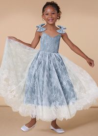 Have you flower girl dress beautifully in our effortless chantilly lace dress, Tilly. Her V-neckline bodice is held by straps that have bows at the shoulders. The skirt is a playful A-line gown that lets her twirl to her heart's content. We have made this dress come in a few of our favorite colors to compliment perfectly with any bridal party.