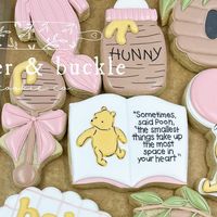 Morgan Mathis Arbuckle on Instagram: "I don’t mind repeating this theme one bit 🍯🐝 
(Can’t remember if I tagged her last time but hunny bottle inspo : @dough_by_mo 🩷)

#winnethepooh #winniethepoohbabyshower #winniethepoohbabyshowercookies #winniethepoohcookies #babyshowercookies #templetx #beltontx #saladotx #bellcountytx #bellcountycookies"