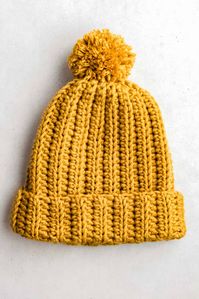 Learn how to make an easy crochet beanie hat with stretchy knit-look half-double crochet ribbing and chunky bulky-weight yarn. Free crochet hat pattern for beginners.