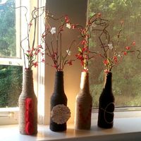 Awesome window decoration! DIY beer bottles, twine ans add on's :)