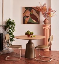 A play on shape, form and fancy details, our Soiree Dining table is both sturdy and elegant all at once. The round diameter top in crown cut oak veneer sits atop a powder coated steel base, with ample space to nestle friends around as you Soiree from breakfast into the evening.