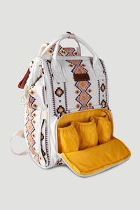 Whether for work, shopping, or traveling, this Wrangler Aztec Backpack for Women in Pink and Yellow is the perfect accessory. Featured with an Aztec design, top zipper closure, and multiple pockets, this bag is not only practical for everyday use but also super trendy and stylish!Features:WranglerStyle: WG2204-9110-TNColor: Cream/Pink/Yellow100% PolyesterAllover Aztec pattern print on canvasMain zipper compartment with 5 interior pocketsSpacious open pocket compartment at back gives access to inside backpack and pockets on both sidesUse for everyday useAdjustable padded and shoulder strapsExtended wear10.8" x 14.3" x 7.2"