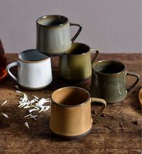 These brown ceramic glazed mugs are a great way to add a touch of warmth and sophistication to your morning coffee or tea. The mugs are made of high-quality ceramic and are glazed in a rich brown color that is both stylish and durable. They are also dishwasher and microwave safe, making them easy to care for. The mugs