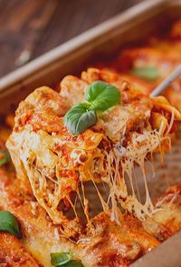 If you are looking for an Easy Lasagna Recipe you have just found it! This recipe for lasagna takes a few shortcuts to result in a delicious version of lasagna that can be made on the busiest of days!