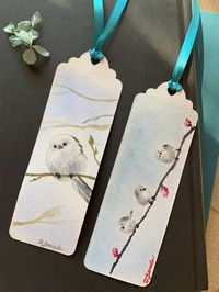 "Original watercolor paintings on paper bookmarks with decorative ribbon. Size: 2\" x 6\". Set of 2."