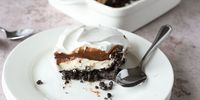 Indulge in this girdle-busting cookie pie that layers whipped topping, chocolate pudding, and sweet cream cheese mixture over a Double Stuf Oreo® crust.