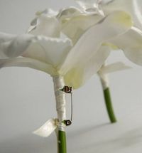 What a great idea! Not sure how you're going to incorporate a pin in your boutonniere? Sneak a safety pin on the reverse side and it makes for a quick and easy pin job! :)