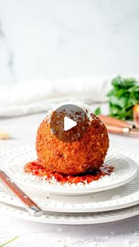 Rebecca Eisenberg on Instagram: "It's been a hot minute since we talked about these GIANT stuffed arancini recipe. This recipe was inspired by @scopaitalianroots, and each of these crispy fried rice balls are filled with ground sausage, peas, and *two* types of cheese. Is there anything more satisfying than the moment you cut into one and see the steam escape? I don't think so! Find the recipe on my site ThePracticalKitchen.com or at the link in my bio. ⁠ ⁠ ⁠ #arancini #cheese #italianfood #foodlover #deepfried #riceball #friedrice #scopaitalianroots #hungry #instafood #foodstagram #foodblogger #foodporn #deepfried #munchies #aranciniballs"