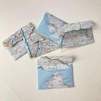 Mini envelopes made from real pages from old road map books. Each envelope is 9cm x 6cm (3.5" x just under 2.5"). They are the size of a standard business card.  Choose from a set of 5 or set of 10. Each envelope is handmade from the pages of an old UK road map book, the places shown on the envelopes will vary. * Please not that map book pages are made from quite thin paper, these envelopes are very cute but not super robust so you do need to handle them with care*  Perfect for using as envelopes to gift money, a gift card, ticket or voucher. Or use them for junk journaling, scrapbooking, card making etc.  Actual colours may vary slightly from the photos as every computer monitor has a different capability to display colours, and everyone sees colours differently. We edit our pictures to m