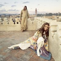 Talitha and John Paul Getty Jr on the terrace of their holiday house in Marrakesh for @voguemagazine, 1969⁠. Shop The Most Investment-Worthy Photography for Your Home at our #Miami showroom or online. .⁠ #artandphotography #photographyart #artcollector #artcollectors #fashionphotography ⁠#fashionphotographer #fashiondaily #photographydaily