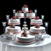 8 TIER WEDDING CAKE STAND. PLATES AND PILLARS ARE INTERCHANGEABLE THAT ALLOWS YOU TO DESIGN YOUR OWN CAKE STAND. FOUNTAIN, FLOWERS AND DUMMY CAKE NOT INCLUDED. THE TUBES/PILLARS FITS INTO THE PLATES PERFECTLY THAT MAKES IT VERY STABLE.