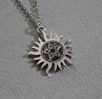 Supernatural inspired Charm Necklace. Pentagram Pendant. Supernatural Tattoo Charm. Sam and Dean. Sam Winchester. Dean Winchester.  Tibetan silver charm of a pentagram sun on a stainless steel chain which fastens easily and securely with a stainless steel clasp.  The charm pendant is approx. 40mm across. All necklaces come with a 2 inch extension chain.  Please do not wear your necklace in water.