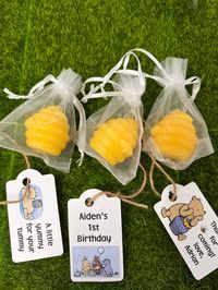 Winnie the Pooh inspired favor tags perfect for baby showers and birthdays! These party favors are also perfect for any summer or bee theme event. tags can be customized with just about anything. Item details Size shown is 2 inches rectangle shape. Size and shape can be customized to your liking. Choose from 1 inch , 2 inch, & 2.5 inch Sold as a set of 12 tags with jute. If you purchase complete set you will get 12 candles with custom tags. Can be customized with your personal saying, different