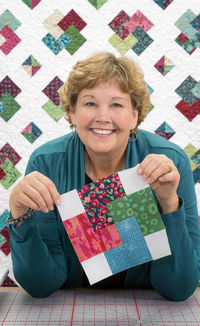 Watch this Square Block Jelly Roll Card Trick Quilt Tutorial. Jenny demonstrates an easy way to sew a difficult old fashioned block, the card trick. She used a "Twilight Tones" jelly roll by Nancy Rink for Marcus Fabrics. Follow Missouri Star Quilt Co. for more Modern Quilting Designs for Quilting tutorials.