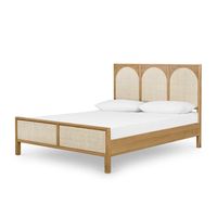 Au naturale. A light oak bed frame features trend-forward cane arches and panel footboard detailing, for a soft, neutral look with lasting modernity. Product Overview Dimensions: Twin: 49"W x 79"D x 48"H Queen: 63"W x 84"D x 48"H King: 79"W x 84"D x 48"H Weight: 115 lbs Colors: Honey Oak Veneer Materials: Oak Veneer, S