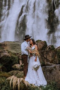 Marokopa Falls bridal shoot New Zealand by Anela Benavides. This blog post includes elopement inspiration bridal fashion groom fashion bride and groom portraits and elopement inspiration. Book your New Zealand elopement and browse the blog for inspiration photography weddingplanning elopementtips elopementphotography elopement