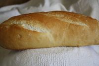 4 simple ingredients make up this rustic but flavourful, lovely bread. It has been said that only these 4 ingredients are allowed in order to make this a True French bread. Of course this recipe can be used for both your larger French Breads as well as the Baguette.