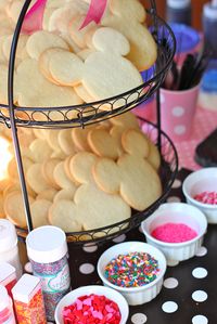 How cute is this? A "decorate your own sugar cookie" station for a Minnie Mouse party.