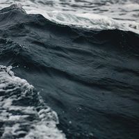 A close-up, aesthetic photograph waves in the ocean.