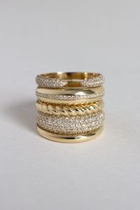 A classic dome ring—elevated with an added row of round, channel set diamonds. Designed and created in Los Angeles with ethically and sustainably sourced diamonds. 14k solid gold—always Hollow Band width: 5.1mm (front) and 3.1mm (back) Height off of finger: 2.5mm Natural diamonds Diamond 4 C's: 0.13ctw, Round, VS2, F/G Custom sizing is available. Custom sized pieces are final sale. This piece is made to order. Please allow at least 10-15 business days for production.