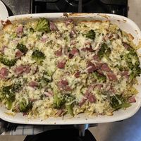 An old family favorite, this creamy casserole makes your leftover cooked ham into a nice supper. It's made with sour cream, mozzarella cheese, spiral pasta, and mushroom soup, and is sprinkled with parsley.