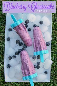 These easy to make Blueberry Cheesecake Popsicles are rich and creamy, cold and bursting with fruit flavour.  #popsicles #cheesecakepopsicles #popsiclerecipe #icepops #blueberrycheesecake #popsicle