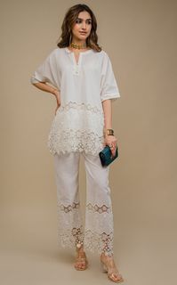 PRODUCT DETAIL: Indulge in the sheer beauty of this cream co-ord set, adorned with intricate cutwork embroidery. The combination of soft fabric and relaxed, comfortable fit makes it the perfect outfit for embracing the summer season.  SPECIFICATIONS:   Color Cream Fabric Cotton Blend Product Code Sehr19