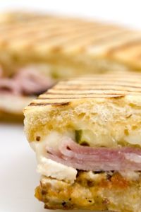 Cuban Midnight Sandwich Recipe with ham, turkey, melted swiss cheese, pickles & mustard with a creamy seasoned mayonnaise