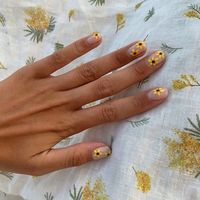 Floral nail designs never go out of style. To score the look for yourself, check out the 30 intricate nail art ideas, here.