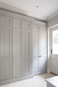 Open up bedroom wardrobe and add tall shaker doors like this