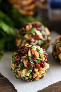 Cranberry Pecan Goat Cheese Truffles: these festive mini cheese balls only take 15 minutes and are loaded with creamy goat cheese, cranberries and crunchy pecans!