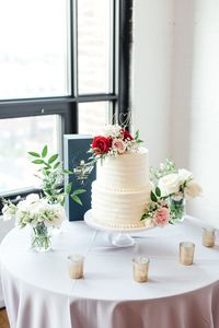 Anyone else dying for a piece of this elegant confection?   Photo Credit: Oak & Myrrh Photography | Florist: Threads and Blooms | Dessert Table: Sanremo Bakery