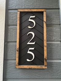 "The sign pictured is 18\"x8\". 2 numbers - 16\"x8\" 4 numbers - 18\"x8\" 5 numbers - 24\"x8\" Sign includes a d - hook on the back and is sealed for outdoor use. It's best not to leave this exposed directly to rain or snow. It is sealed multiple times for protection and undergoes a long curing process! Back of sign and frame is made with pine while the herringbone and numbers are made with Baltic birch. I can do any color combo, just specify what you'd like in the order form :) Sign is made to