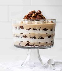 Peanut Butter Brownie Trifle is a layered dessert of brownie pieces, homemade peanut butter pudding, mini Reese's Peanut Butter Cups, and whipped topping. Trifle, Dessert Trifle, How to Make a Brownie Trifle, Brownie Trifle, Peanut Butter Pudding, Layers Trifle, Baking, Recipes, Summer Desserts, BBQ, Party Dessert, i am baker, iambaker