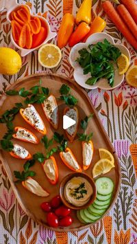 Sarah Reed on Instagram: "It’s the first day of spring and here’s the snack that I had ready for the girls when they got home from school! 🥕Although if we’re keeping it real, Annabelle was home sick today since we’re all going down one by one, but we don’t have to talk about that. I love a fun snack board and with Easter coming up, I thought it would be cute to make some mini peppers disguised as carrots. I used parsley as the carrot tops and I filled some with homemade hummus and some with whipped cream cheese topped with everything bagel seasoning or green goddess seasoning. Save this idea for your Easter spreads and send it to your favorite veggie-loving friends! 🫑 I’m going to get my hummus recipe up on my blog, comment below if you’d like a link!

Tea towel from @geometry.house - us