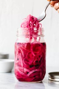 Pickled red onions is the ultimate flavor-boosting tool. They're tangy, slightly sweet, and punchy - perfect for tacos, bowls, and more!