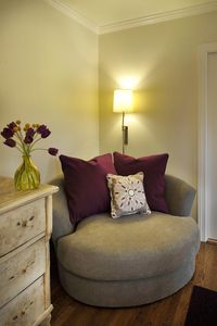 Great corner chair Choose an oversized chair in a small space -- makes a statement -- gives comfy style. PH Interiors