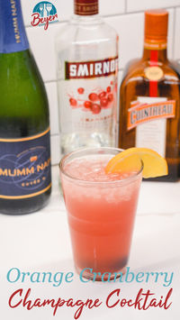 The Cranberry Orange Champagne Cocktail is a fruity cocktail that champagne with vodka, orange liqueur, cranberry juice and orange juice. This cocktail is a great Christmas Punch and can also be made as a mocktail.