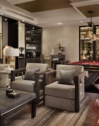 Luxury International Interior Architecture and Design project by Katharine Pooley. Games room. Pool Table. Beautiful Red and Neutral colour scheme with dark accents.