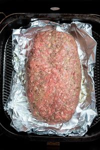 Meatloaf in an Air Fryer is an easy dinner for weeknights or lazy weekends. This Air Fryer Meatloaf Recipe is a traditional meatloaf slathered with a sweet tangy glaze then air fried to perfection. #airfryermeatloaf #airfryermeatloafrecipes #meatloafrecipes #glazedmeatloaf #dinnerrecipes #easydinnerrecipes #beefrecipes