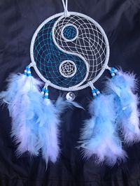 7" white and blue yin yang dream catcher with glow in the dark web. Available on eBay