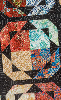 Save this Free Easy Quilt Tutorial: How to Make a Ring of Fire Quilt! Jenny Doan is making a fiery ring of patchwork with precut layer cake squares from the Artisan Batiks Hermosa collection by Robert Kaufman. This pattern is based on the super-simple Pecking Order quilt, but a quick border gives each block an extra layer of pizzaz. Follow Missouri Star Quilt Co. for more Quilting Tutorials!