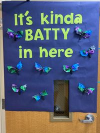 Bat craft made from coffee filters and clothespins.