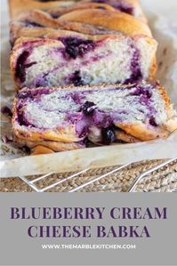 Buttery brioche dough rolled up with sweetened cream cheese and homemade blueberry preserves. Serve this at your next brunch or breakfast and be the star of the show! #babka #easterrecipes #easterbrunch #blueberryrecipes | themarblekitchen.com