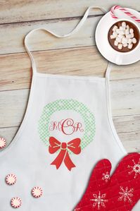 Make a Monogrammed Apron Gift with Martha Stewart, Cricut, and Michaels by Pineapple Paper Co. #cricut #cricutmade #ad #cricutexploreair2 #monogrammed #monogrammedgift #cricutmarthastewart #madewithmichaels #kidsapron #diygiftideas