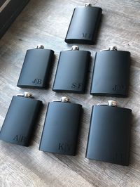 "Each black flask has a smooth matte black powder coating which makes them the perfect pocket hip flask. Each flask is manufactured with 18/8 grade #304 stainless steel. These flasks are extremely durable, dent resistant and rust proof. Guaranteed not to rust or corrode. Professionally personalized with anything you wish and as much text as you wish, these flasks make a perfect gift for any event. ADDITIONAL DETAILS: * Black Matte Flask * Material: Food Grade Stainless Steel * Size: holds 6 ounc