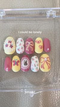 my little pony fluttershy inspired nail set by @joh.nail on instagram