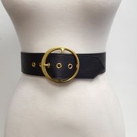 "Great Statement Brass Buckle belt Width is 2.2\" or 55 mm , can fit most jean loop as shown in photo, or can be wear as high waist. Belt is made with non-animal,vegan leatherette. Super Trendy Signature Statement Buckle piece in brass/gold plating Strap has snaps so buckle is removable Length of the belt strap (start of strap to middle hole) S/M: 32\", M/L: 35\", L/X:38\" then from the middle hole to the tip is 6\" more For Example, total strap length for M/L will be 41\" Please compare with yo